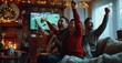 © Luba - Group of Friends Having Fun Watching Sports