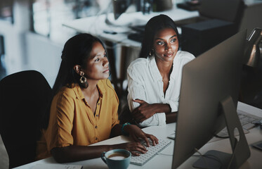 Wall Mural - Business women, computer and typing email with feedback, collaboration and teamwork. Female people, tech and cooperation in working late on project for advice, corporate pitch or proposal in office