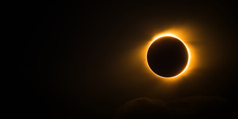 Wall Mural - dramatic solar eclipse with the sun's corona glowing around the darkened moon, casting a golden ligh