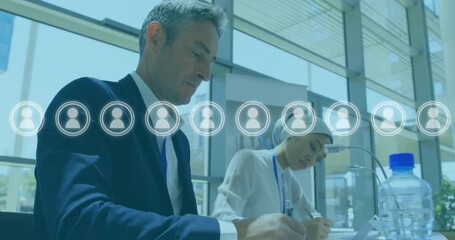 Poster - Animation of people icons over diverse business people in office
