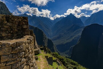 Wall Mural - Stunning Machu Picchu landscape with ancient ruins and mountains.