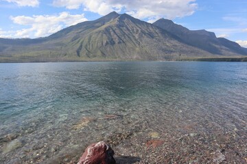 Wall Mural - Mountain range reflecting in clear lake waters