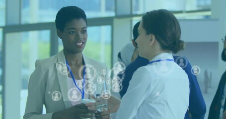 Poster - Animation of people icons over diverse business people in office