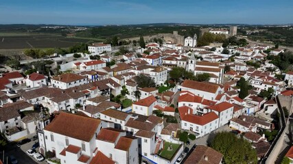 Wall Mural - Obidos Town in Portugal. It is located on a hilltop, encircled by a fortified wall. Famous Place. 4k