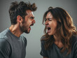 © Alexandru - Young couple angrily yelling at each other in close-up face-off, representing intense conflict, frustration, and communication breakdown in a personal relationship