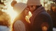 © kukichart - Closeup up photo of a European young couple hugging and kissing in winter park at sunset, wearing knitted hats and warm clothing