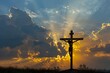 © Yuliia - powerful image capturing the symbolic essence of resurrection at Golgotha Hill, with a silhouette of Jesus on the cross against a backdrop of divine light breaking through the clouds.