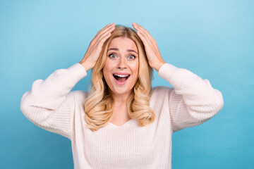 Sticker - Photo of overjoyed cheerful nice woman wear trendy white clothes hand head isolated on blue color background