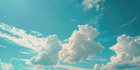 Sticker - Soft white clouds on a vibrant blue sky