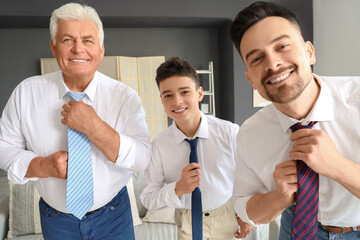 Poster - Teenage boy with his dad and grandfather in suits at home