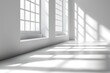 © Outkast - Sunlight streaming through two windows in a white room casting shadows on the floor