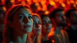 © atar - Close up of attentive audience at a live event, looking on with anticipation and engagement.