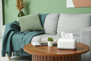 Wall Mural - White paper tissue box on wooden coffee table in living room