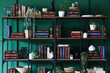 © Pixel-Shot - Shelving unit with books and houseplants near green wall in room