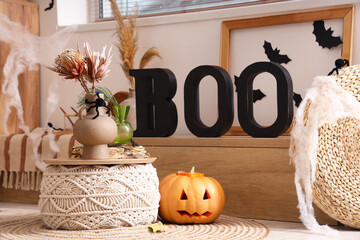 Poster - Creepy living room with Jack-O-Lantern, pouf and bench decorated for Halloween celebration