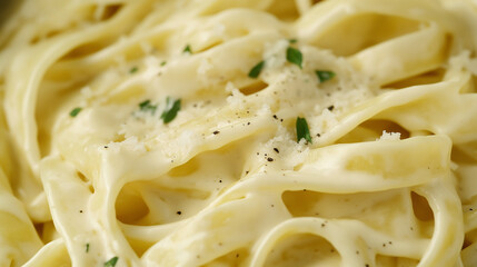 Wall Mural - a close-up, top-down view of fettuccine alfredo, filling the entire frame with the focus on the pasta's intricate details