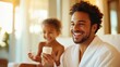 © LifeMedia - A father and his child share a joyful moment with coffee cups in the morning, both smiling happily and enjoying their time together in a cozy home setting.
