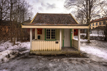 Wall Mural - Oslo - February 11 2023: Traditional Scandinavian buildings in the Oslo Open air Museum in Oslo, Norway