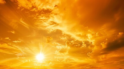 Wall Mural - golden sky sunset cloud sky background in evening gold sky hour with romantic orange yellow warm sun