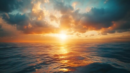 Wall Mural - sunset sky clouds over sea in the evening with orange yellow gold sunlight in golden hour and dramat