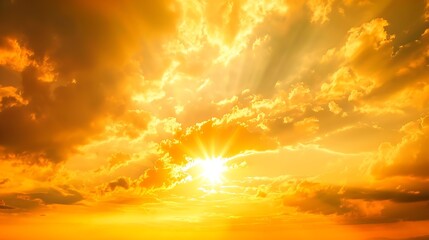 Wall Mural - golden sky sunset cloud sky background in evening gold sky hour with romantic orange yellow warm sun