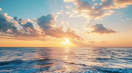 Wall Mural - sunset sky clouds over sea in the evening with colorful orange sunlight reflect on the sea landscape