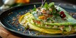© AkuAku - Colorful Green Crepes or Blini with Crab Meat Avocado Mousse and Hollandaise Sauce Garnished with Micro Greens and Pumpkin Seeds Gourmet Appetizer Fine Dining Close up Shot