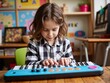 © Derek Brumby - A young girl, seated and focused, plays on a colorful electronic keyboard, demonstrating her creativity and love for music, surrounded by colorful and musical elements.