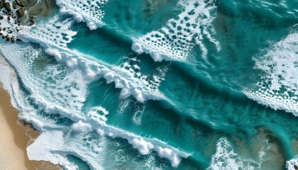 Turquoise Ocean Waves Crashing on Pristine Sandy Beach in Aerial View