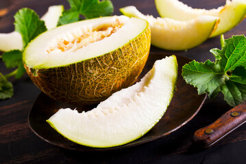 Wall Mural - Honey melon on a table.