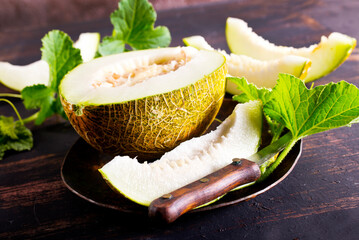 Wall Mural - Honey melon on a table.