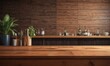 © Bualong - A wooden countertop with various kitchen utensils and a potted plant in the foreground, set against a rustic wooden wall with a blurred background of bottles and glasses.