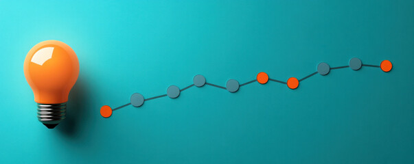 Poster - A light bulb is on a blue background with a line of dots. The line of dots is a graph that shows a progression. Concept of growth and development