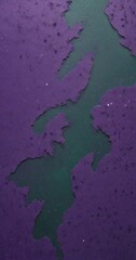Aufkleber - a close-up view of a textured purple surface with a greenish-blue background.