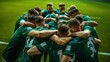 © Usman - Team huddle, Players with a green jersey, the national football team huddling before the game