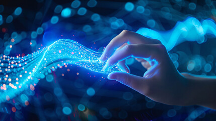 Aufkleber - A human hand gently interacting with glowing blue particles, creating a sense of magic as they flow through the air, representing connection and energy.