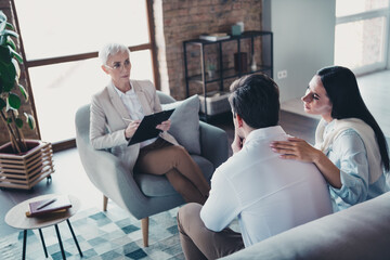 Poster - Photo of young couple appointment experienced lady psychotherapist loft interior office indoors