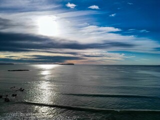 Poster - Serene seascape with reflections from the setting sun