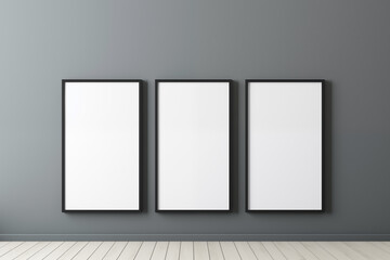 Mockup of three verticle blank black frame with white canvas hang on grey wall backdrop and light wood floor 3D poster art display gallery