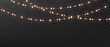 © Ann_Sereda - Christmas string lights isolated. Glowing realistic garlands on dark background. Holiday shimmering lights.