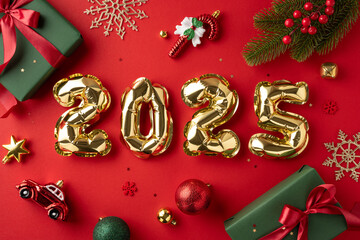 Sticker - Golden 2025 balloons surrounded by festive holiday decorations, including gifts and ornaments, create a cheerful and celebratory atmosphere