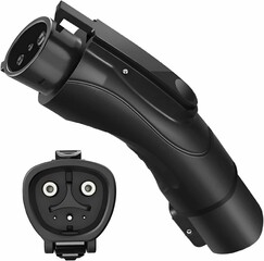 Black electric vehicle charging plug and socket close-up.