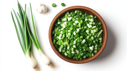 Green onion in wooden bowl isolated on the white background. Top view. Flat lay.