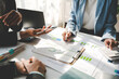 © Daenin - Various colleagues work together in a conference room. Brainstorming, discussion, analysis, and business strategic planning..teamwork concept