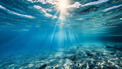 Ethereal underwater tranquility with radiant sunbeams piercing through clear blue ocean depths