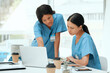 © peopleimages.com - Doctors, women and laptop for research, brainstorming or internet with results, medical website or email. People, colleagues or nurses with pc, online reading or schedule for hospital ward or network