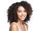 © BlazingDesigns - Beautiful african american girl with an afro hairstyle smiling on transparent background PNG.