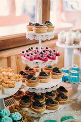 Wall Mural - Assorted pastries and desserts on a tiered stand.