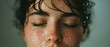 © Ai Studio - Close-up of a face with water droplets, eyes closed in a serene expression, conveying calm and contemplation.