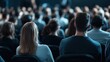 © Business Image - Captivated audience in conference hall - keynote speech on professional development